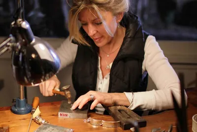 Rockstar Blends founder hand forging silver jewelry, San Diego, California